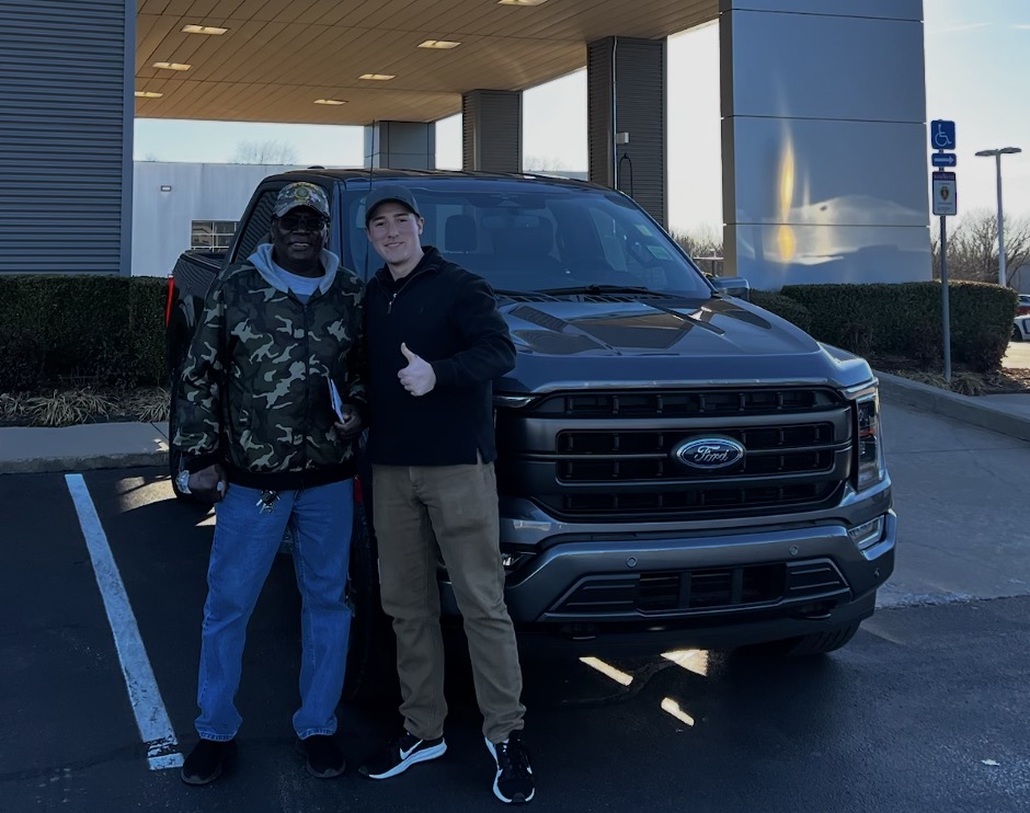 Customer picking up a Ford F-150 with Rylan Beebe